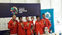Tim sepak takraw Indonesia meraih emas Asian Games 2018. (Liputan6.com/ Luthfie Febrianto)