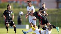Timnas Kroasia harus puas bermain imbang 1-1 kontra Armenia pada laga uji coba di Velika Gorica, Selasa (1/6/2021) malam WIB. (AFP/Damir Sencar)