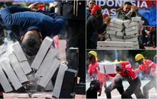 FOTO: Aksi Polisi Aceh Unjuk Kekuatan di HUT ke-78 Bhayangkara, Bikin Merinding saat Pecahkan Tumpukan Balok dengan Kepala