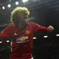 Marouane Fellaini mencetak gol pertama Manchester United (MU) ke gawang Wigan Athletic di Piala FA. (AP Photo/Rui Vieira)