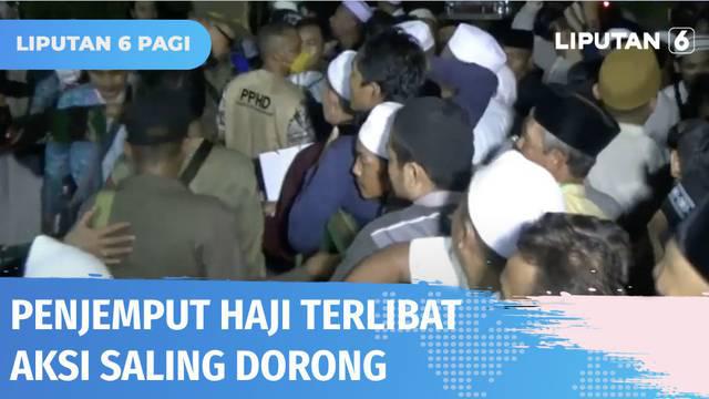 Aksi saling dorong mewarnai kedatangan ratusan jemaah haji di Kecamatan Tigaraksa, Kabupaten Tangerang pada Selasa (19/07) dini hari. Para penjemput yang belum diizinkan menemui keluarga menerobos Kantor Kemenag hingga petugas kewalahan.
