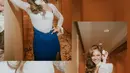 Atasan ini dipadukan dengan rok slit tinggi diru dan detail mawar putih yang bikin mirip Rosalinda [@lalamarionmj]