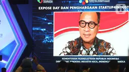 Menteri Perindustrian Agus Gumiwang memberikan sambutan secara virtual pada penghargaan kompetisi Startup4Industry 2020 di Jakarta, Selasa (08/12/2020). Kompetisi mengusung 3 topik yaitu : e-Commerce enabler, Masa Adaptasi Kebiasaan Baru dan Efisiensi Manufaktur. (Liputan6.com/Pool/Kemenperin)