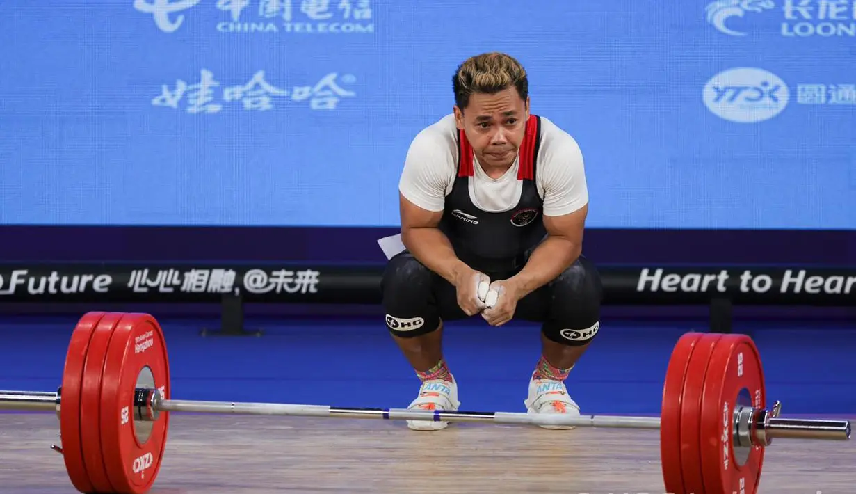 Atlet angkat besi senior Indonesia, Eko Yuli Irawan gagal menyumbangkan medali di ajang Asian Games 2022 Hangzhou, China. (Dok. NOC Indonesia)