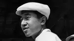 Putra Mahkota Akihito terlihat selama turnamen tenis di resor Karuizawa, Jepang, 20 Agustus 1958. Kaisar Akihito akan mengakhiri pemerintahannya pada hari ini, Selasa 30 April 2019. (INTERCONTINENTALE/AFP)