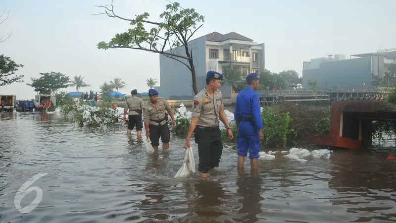 20160604-Akibat Tanggul Jebol Perumahan Pantai Mutiara Terendam Banjir