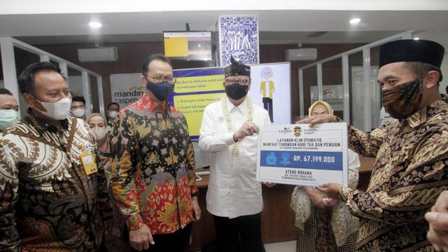 Profil bank mandiri taspen pos