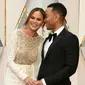 Dilaporkan bahwa John Legend mengalami perampokkan saat berada di bandara. Barang yang diambil berupa pakaian yang berjumlah banyak serta aksesoris yang bernilai ratusan dolar. (AFP/Bintang.com)