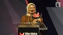 Dalam sambutannya, Menaker Ida menyampaikan terima kasihnya atas apresiasi yang diberikan oleh Merdeka.com. "Kemnaker mengucapkan terima kasih kepada merdeka.com yang telah memberikan apresiasi kepada program inovatif yang kita kembangkan dan juga sebagai pengakuan publik atas kerja Pemerintah," ujar Ida Fauziyah. (Merdeka.com/Imam Buhori)