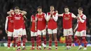 Pemain Arsenal tampak kecewa setelah kalah adu penalti dari Sporting CP pada leg kedua babak 16 besar Liga Europa di Stadion Emirates, Jumat (17/3/2023). (AP Photo/Ian Walton)