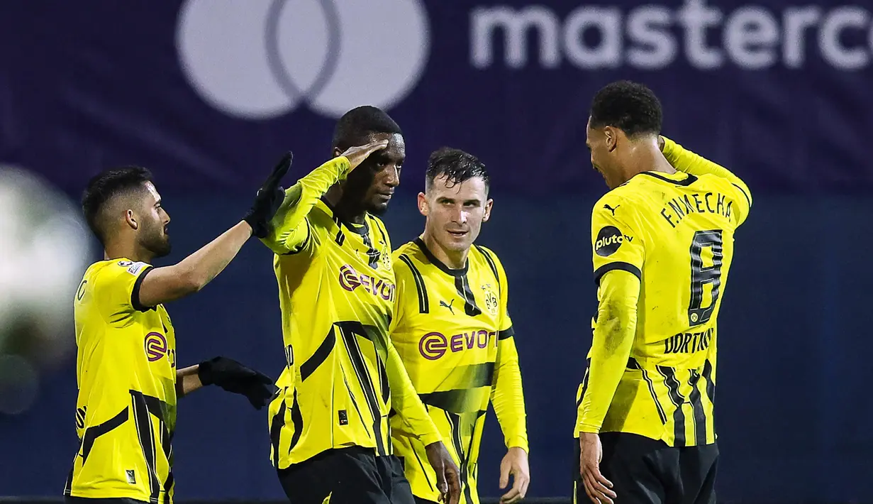 Jelang akhir pertandingan atau pada menit ke-90, Serhou Guirassy berhasil mencatatkan namanya di papan skor. Borussia Dortmund unggul 3-0 atas Dinamo Zagreb. (Damir SENCAR/AFP)