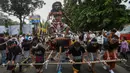 Usai melakukan ritual dan upacara Tawur Agung Kesanga, umat Hindu melaksanakan pawai ogoh ogoh. (merdeka.com/Arie Basuki)