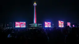 Suasana nonton bareng pertandingan perebutan juara ketiga Piala Asia U-23 2024 antara Timnas Indonesia U-23 melawan Irak U-23 di Kompleks Monumen Nasional (Monas), Jakarta, Kamis (03/05/2024). (Bola.com/Bagaskara Lazuardi)