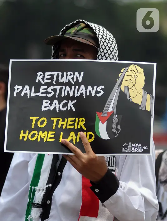 Massa mengecam Amerika Serikat yang membantu Israel dalam perang melawan Hamas. (merdeka.com/Imam Buhori)