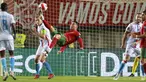 Penyerang Portugal Cristiano Ronaldo (tengah) mencoba mencetak gol dengan tendangan overhead ke gawang Luksemburg pada lanjutan Kualifikasi Piala Dunia 2022 di Stadion Do Algarve, Rabu (13/10/2021) dini hari WIB. Hat-trick Ronaldo membuat Portugal menang 5-0 atas Luksemburg. (AP Photo/Joao Matos)
