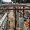Aktivitas pekerja saat menyelesaikan pembangunan proyek MRT Fase 2 Monas, Jakarta, Selasa (20/9/2022). Fase 2A memiliki total panjang jalur 5,8 kilometer. (Liputan6.com/Faizal Fanani)