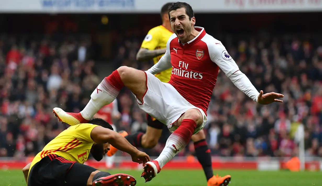 Henrikh Mkhitaryan. Gelandang Armenia yang memperkuat Arsenal selama 3 musim mulai pertengahan 2014/2015 ini dilepas secara gratis ke AS Roma pada awal musim 2020/2021. Hal ini terjadi lantaran pihak Arsenal tidak menawarkan konrak baru hingga habisnya masa kontrak. (AFP/Ben Stansall)