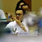 Menteri ESDM, Sudirman Said menyimak keterangan Komisi VII saat membahas divestasi saham PT Freeport Indonesia, Blok Masela, Blok Mahakam, pengoperasian Lapindo, hingga harga gas, Jakarta, Senin (25/1/2016). (Liputan6.com/Johan Tallo)