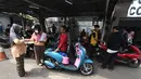 Pemutihan dilakukan terhadap denda pokok dan Pajak Kendaraan Bermotor (PKB) hingga masa pajak 2024 (masa berlaku 2025). (merdeka.com/Arie Basuki)