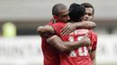 Striker Persija, Bruno Lopes, memeluk Rudi Widodo usai mencetak gol ke gawang Persegres pada laga Liga 1 Indonesia di Stadion Patriot, Bekasi, Sabtu (14/10/2017). Persija menang 5-0 atas Persegres. (Bola.com/M Iqbal Ichsan)