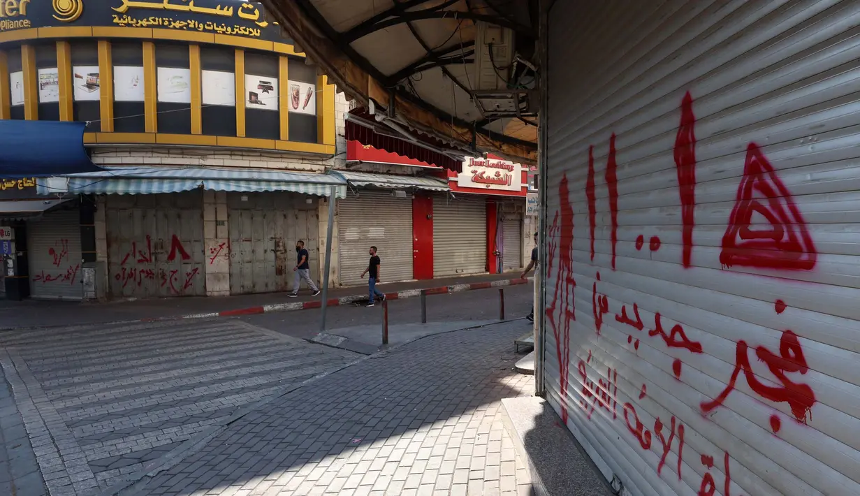 Roda perekonomian di kota Ramallah, Tepi Barat terhenti. (Zain JAAFAR/AFP)