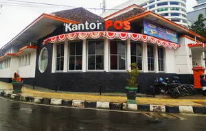 Fitch Pangkas Peringkat Utang Pos Indonesia Usai Gagal Bayar Imbalan Ijarah