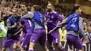 Sejumlah pemain Real Madrid merayakan gol yang dicetak oleh Cristiano Ronaldo ke gawang Juventus pada laga final Liga Champions di Stadion Millennium, Cardiff, Wales, Sabtu, (3/6/2017). Real Madrid menang 4-1. (AFP/Javier Soriano)