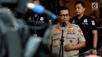 Kabid Humas Polda Metro Jaya Kombes Raden Prabowo Argo Yuwono memberikan keterangan terkait pelimpahan berkas kasus hoaks yang dilakukan aktivis Ratna Sarumpaet ke Kejaksaan Tinggi DKI Jakarta, di Polda Metro Jaya, Kamis (8/11). (Liputan6.com/Johan Tallo)