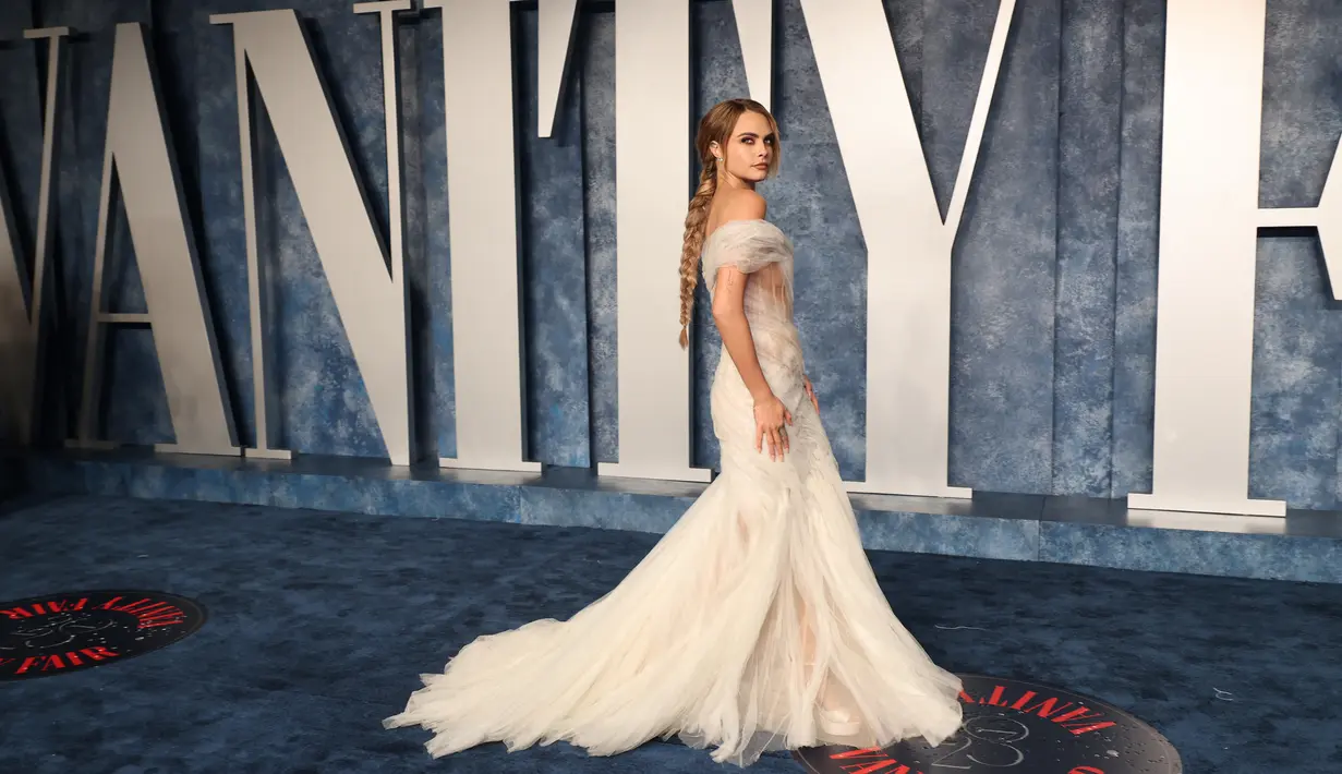 Cara Delavigne berpose saat menghadiri  After Party Vanity Fair Oscar 2023 di The Wallis Annenberg Center for the Performing Arts di Beverly Hills, California pada 12 Maret 2023.  (Amy Sussman/Getty Images/AFP)