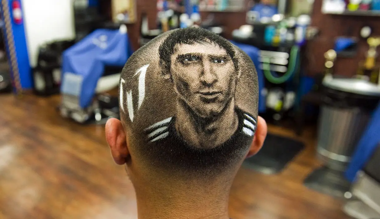 Inilah hasil lukisan wajah Lionel Messi yang dibuat Pemilik salon 'Rob the Original', Rob Ferrel, di San Antonio, Texas, (30/6/2014). (REUTERS/Ashley Landis)