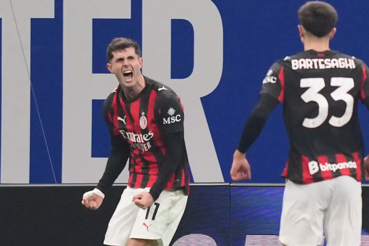 Christian Pulisic merayakan golnya untuk AC Milan