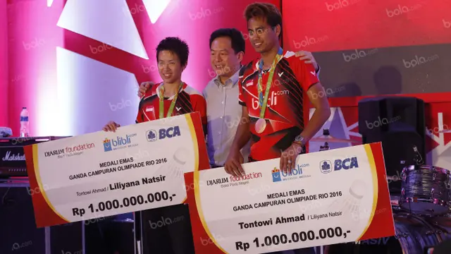 Tontowi Ahmad dan Liliyana Natsir. (Bola.com/Arief Bagus)