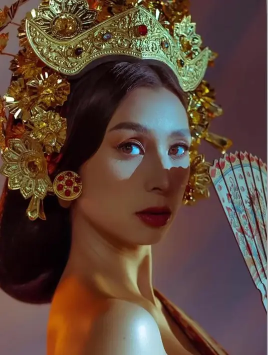 Makeup flawless yang memberikan sentuhan bold pada bibir itu sukses membuat kecantikannya lebih menonjol.