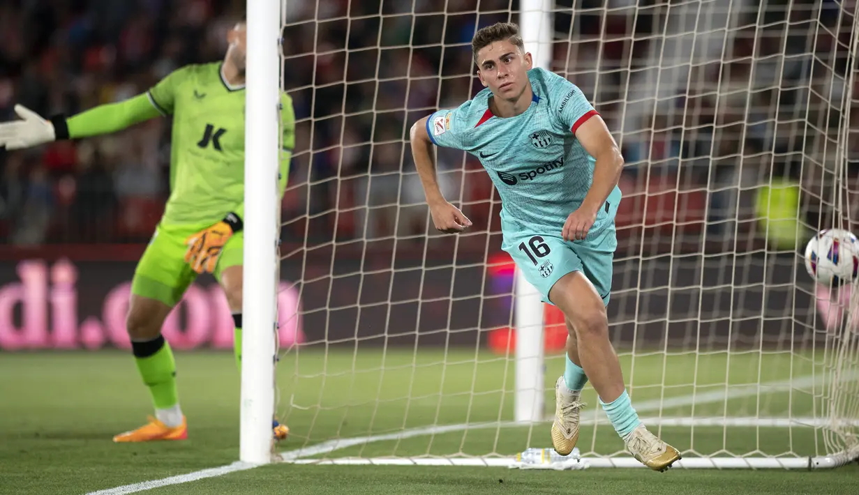 Dua gol kemenangan Barcelona di markas Almeria diborong oleh gelandang Fermin Lopez, masing-masing dicetak di babak pertama dan kedua. (JORGE GUERRERO / AFP)