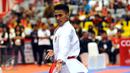 Ahmad Zigi Zaresta saat beraksi di final Junior Kata Male di WKF World Junior, Cadet and U-21 Championship 2015 di ICE Serpong, Banten, Kamis (12/11/2015). Zigi menyumbang emas pertama bagi Indonesia. (Liputan6.com/Helmi Fithriansyah)