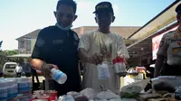 Barang bukti ribuan butir pil koplo yang kemudian dimusnahkan di Mapolres Malang Kota, Jawa Timur (Zainul Arifin/Liputan6.com)