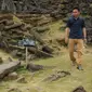 Sebuah batu menyerupai alat musik khas Jawa Barat, Kacapi, bisa ditemui di teras pertama situs megalitikum Gunung Padang di Kampung Cimanggu, Cianjur, Jawa Barat, (20/9/2014). (Liputan6.com/Helmi Fithriansyah)