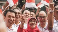 Halimah Yacob ketika menghadiri Hari Kedisiplinan Nasional yang diselenggarakan oleh NTUC, Singapura (10/8). Keputusannya untuk maju dalam pemilihan Presiden didukung serikat pekerja sejak bergabung pada tahun 1978 hingga 2011.(instagram.com/halimahyacob)