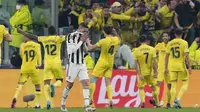 Juventus harus menelan pil pahit usai dipecundangi Villarreal pada laga leg kedua babak 16 besar Liga Champions yang digelar di Allianz Stadium, Kamis (17/3/2022). (AP/Antonio Calanni)