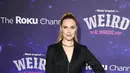 Evan Rachel Wood berpose saat menghadiri pemutaran perdana film "Weird: The Al Yankovic Story" di Alamo Drafthouse Cinema Downtown Brooklyn di New York pada Selasa, 1 November 2022. Bintang Westworld itu melengkapi penampilannya dengan kalung salib perak dan dua rantai lainnya. (Theo Wargo/Getty Images/AFP)