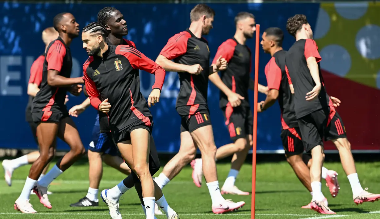 Belgia mesti mengalahkan Ukraina jika ingin lolos sebagai juara grup. (THOMAS KIENZLE / AFP)