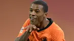 Gelandang Belanda, Georginio Wijnaldum berselebrasi usai mencetak gol ke gawang Bosnia & Herzegovina pada pertandingan UEFA Nations League di Johan Cruyff ArenA di Amsterdam, Belanda, Minggu (15/11/2020). Wijnaldum mencetak dua gol dan mengantar Belanda menang 3-1. (John Thys/Pool via AP)
