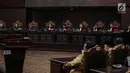 Ketua Majelis Hakim Mahkamah Konstitusi, Anwar Usman didampingi sejumlah Hakim Konstitusi membuka sidang putusan sengketa hasil Pilpres 2019 di Gedung Mahkamah Konstitusi, Jakarta, Kamis (27/6/2019). Sidang tersebut beragendakan pembacaan putusan oleh majelis hakim MK. (Liputan6.com/Faizal Fanani)