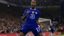 Pemain Chelsea Raheem Sterling melakukan selebrasi usai mencetak gol pembuka timnya pada pertandingan Liga Champions Grup E antara Chelsea FC dan FC Salzburg, di Stamford Bridge di London, Kamis (14/9/2022) dini hari WIB. (AP Photo/Leila Coker)