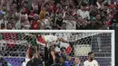 Pemain Yordania, Yazan Al-Naimat merayakan kemenangan timnya atas Korea Selatan setelah laga semifnial Piala Asia 2023 di Ahmad Bin Ali Stadium, Doha, Qatar, Selasa (06/02/2024). (AP Photo/Thanassis Stavrakis)