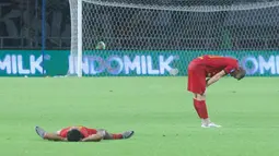 Pemain Persija Jakarta tampak kecewa, Kemenangan yang sudah di depan mata sirna. (Bola.com/M Iqbal Ichsan)
