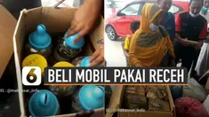 Beredar video pasangan suami istri membeli mobil lunas menggunakan uang receh.