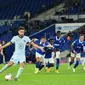 Jorginho menyumbangkan satu gol dari titik putih saat Chelsea menang 3-1 atas Brighton and Hove Albion pada laga pekan perdana Premier League, di Amex Stadium, Selasa (15/9/2020) dini hari WIB. (Glyn Kirk/POOL/AFP)