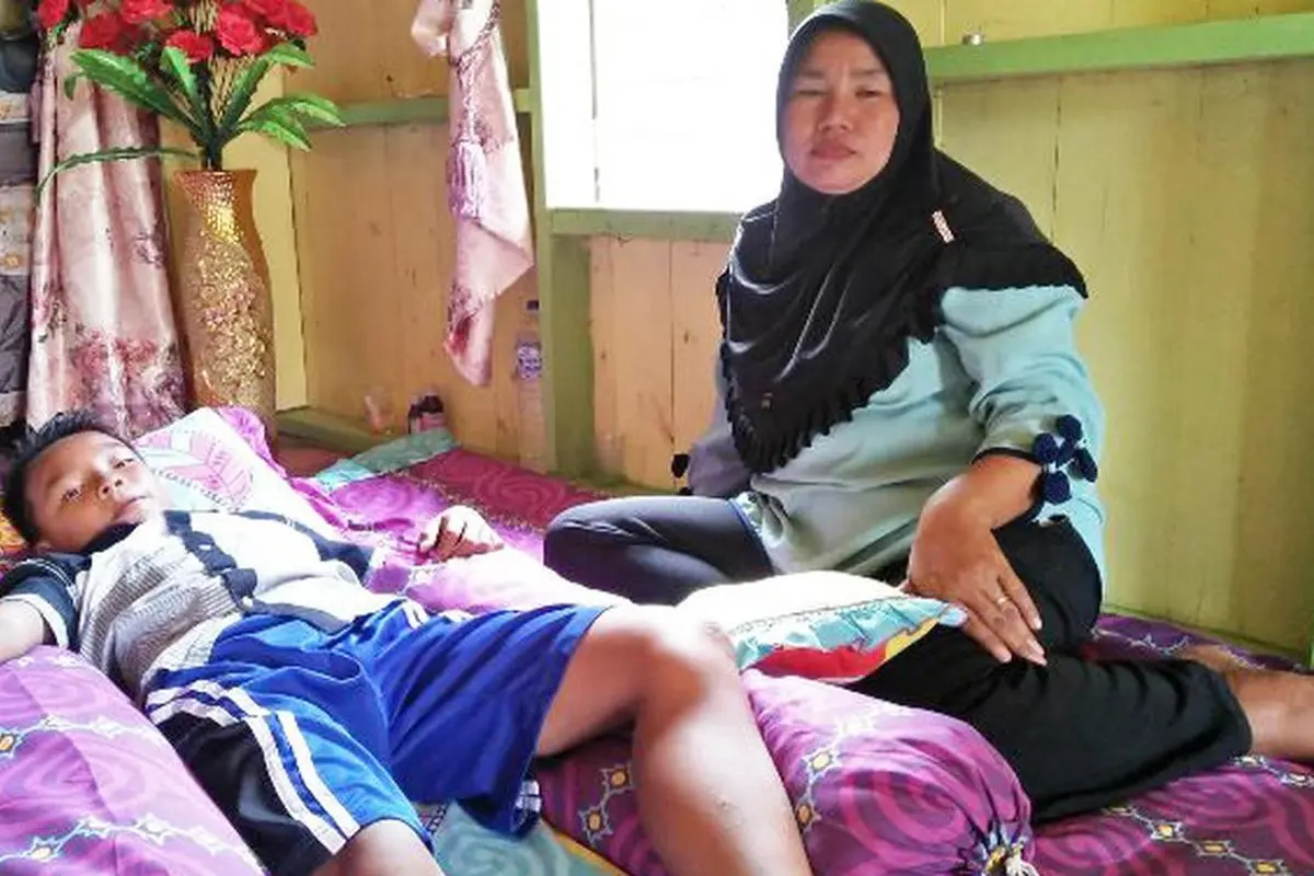 [Bintang] Demi Menyelamatkan Anak yang Diterkam Buaya, Ibu Ini Nekat Terjun ke Sungai