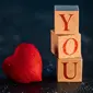 Photo by hasan kurt from Pexels: https://www.pexels.com/photo/i-love-you-lettering-on-wooden-cube-and-red-heart-shape-with-bokeh-for-valentines-day-background-11166360/